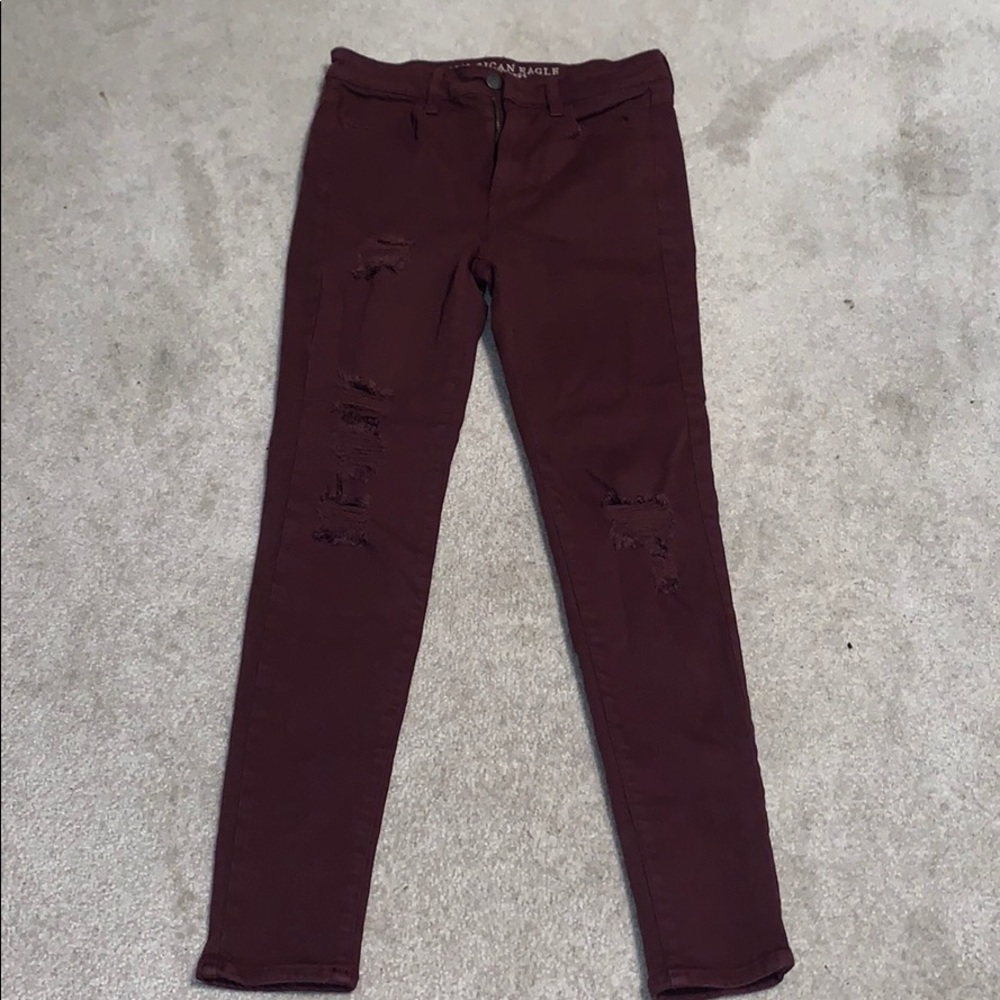 High waisted maroon jeans